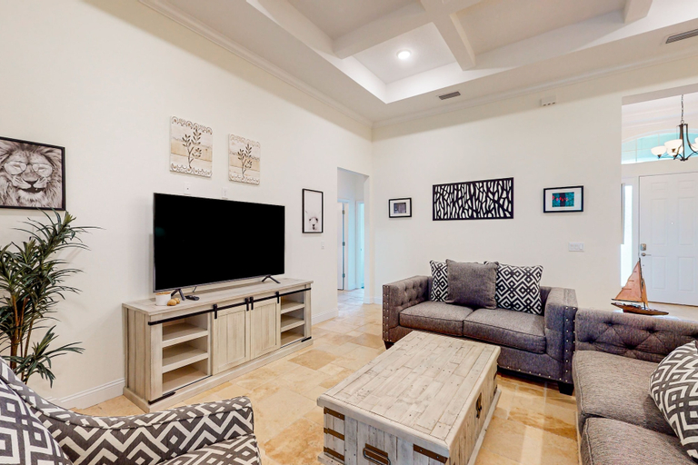 Living area 3, Dog-friendly Home With Tesla EV Charger, Yard, Patio, Grill, AC, & W/D, Flagler