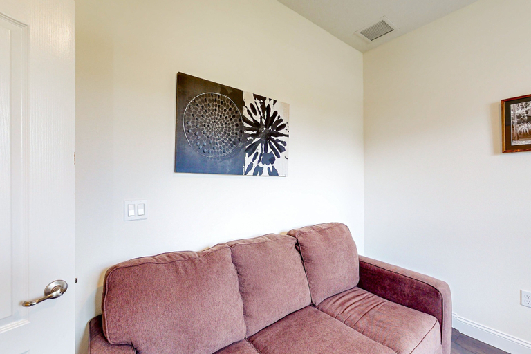 Living area 4, Dog-friendly Home With Tesla EV Charger, Yard, Patio, Grill, AC, & W/D, Flagler