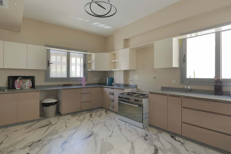 Private kitchen 3, ALSAWAH Spacious Family Villa in Palm Hills Sheikh Zayed, Unorganized in Al Jizah