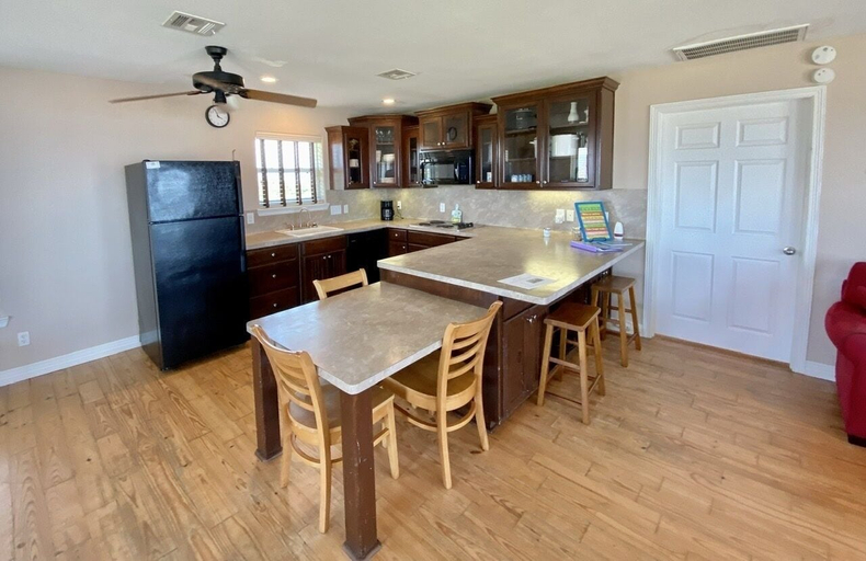Private kitchen, Love Shack 2 Bedroom Home by RedAwning, Galveston