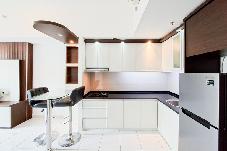 Living Room 3, Neat 1BR for 2 Pax at Casa de Parco Apartment By Travelio, Tangerang