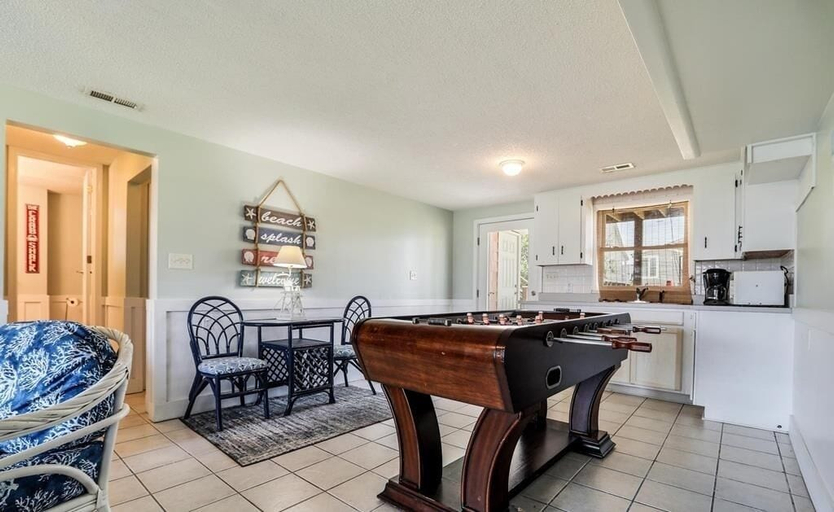Game room 2, Changes In Latitude 6 Bedroom Home by RedAwning, Brunswick