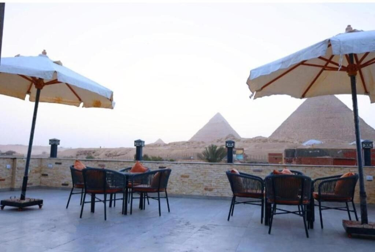 Outdoor dining 4, Happy Pharonic House INN, Al-Ahram