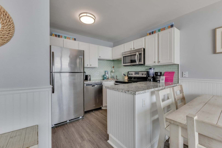 Private kitchen 3, 1106 Seaward Way by Atlantic Towers, New Hanover