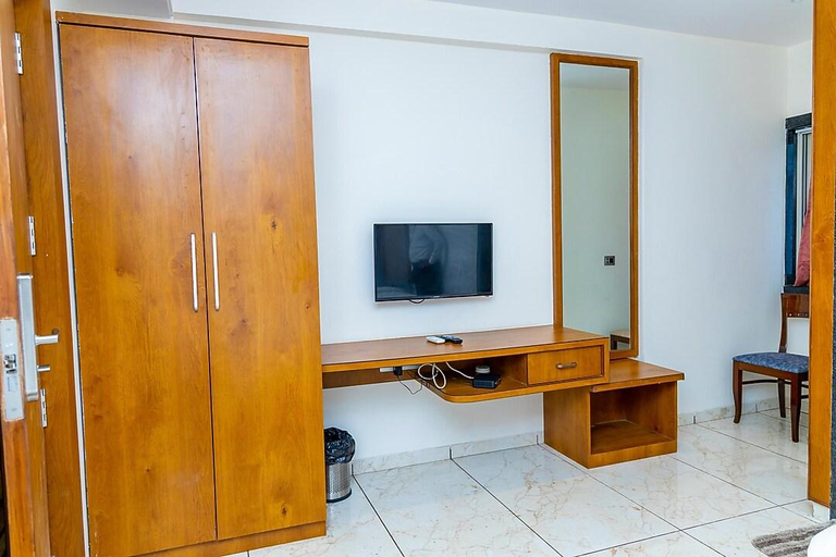 Bedroom 3, Hotel S K Executive, Pune