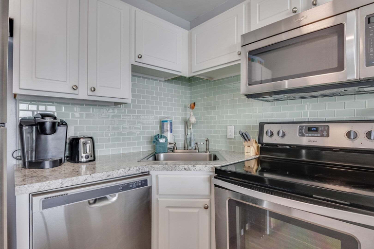 Private kitchen 2, 1106 Seaward Way by Atlantic Towers, New Hanover