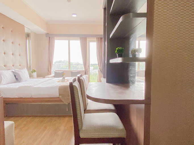 Bedroom 5, Brown Tone Studio at Oasis Cikarang Apartment By Travelio, Cikarang