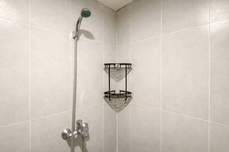 Bathroom 2, Neat Studio for 2 Pax at Royal Sentul Park Apartment By Travelio, Bogor