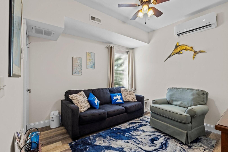 Living area 3, Mi Faro 1 Bedroom Duplex by RedAwning, Carteret