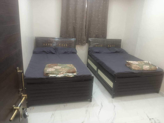 Room 2, Hotel Kulswamini Inn, Nashik