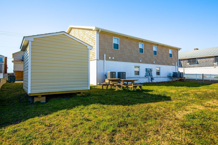 Outdoor dining 3, Boardwalk Shores B 2 Bedroom Duplex by RedAwning, Carteret