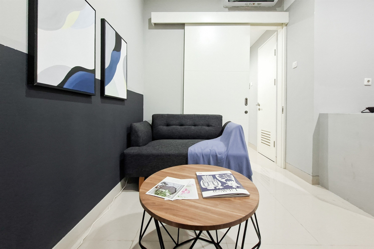 Living Room 5, Tranquil and Chic 1BR at The Ayoma Apartment By Travelio, Tangerang Selatan