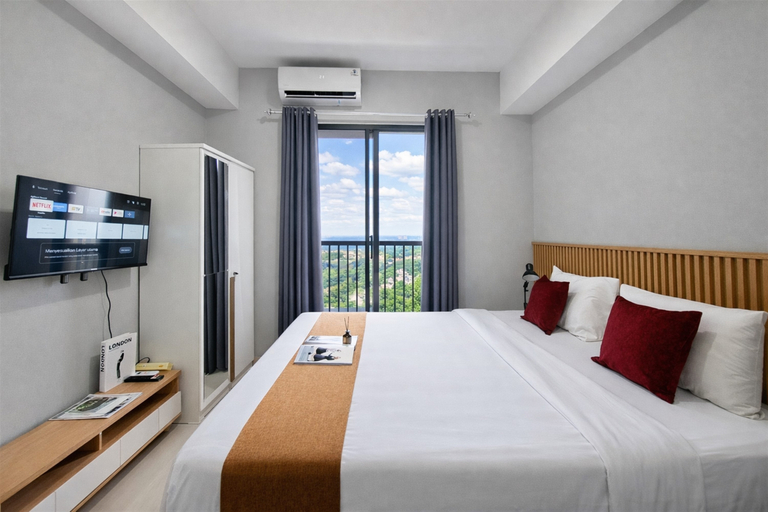 Bedroom 3, Classic and Homey Gray Studio at Apartment The Ayoma By Travelio, South Tangerang