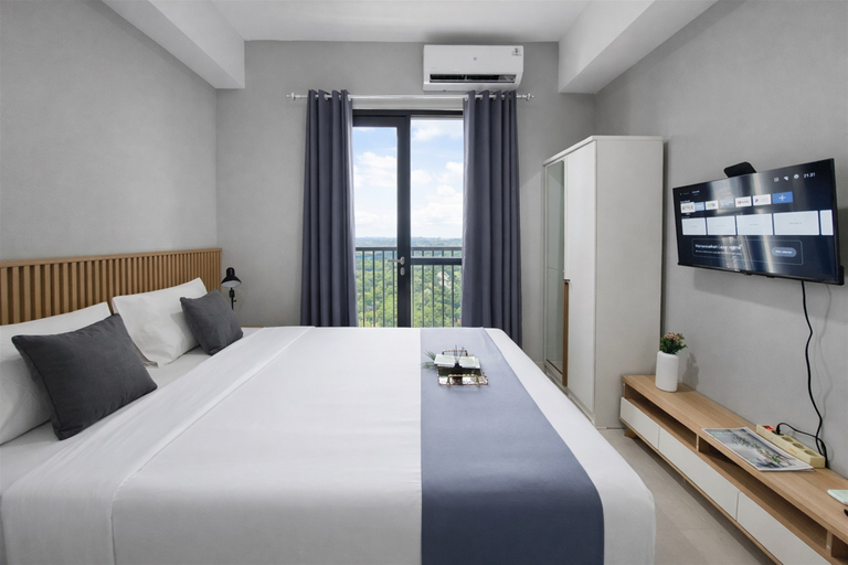 Bedroom 2, Restful Monochrome Studio at Apartment The Ayoma By Travelio, Tangerang Selatan