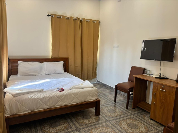 Room 4, aagneyam grand RESORT, Kozhikode