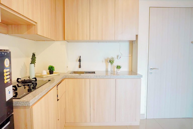 Private kitchen 3, Homey White 2Br At Grand Kamala Lagoon Apartment, Bekasi
