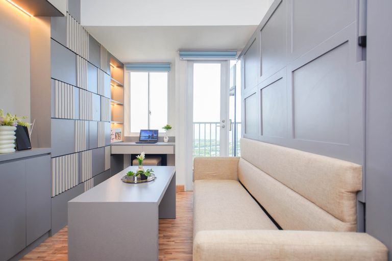 Living Room 2, Restful and Serene Studio at Apartment Tokyo Riverside PIK 2 By Travelio, Tangerang