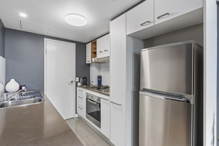 Private kitchen, Bright 1-bed Retreat in Charlotte Towers, Brisbane