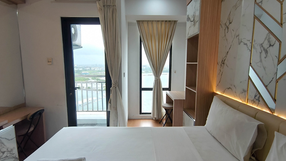 Bedroom 4, Neat and Tranquil Studio at Delft Ciputra Makassar Apartment By Travelio, Makassar