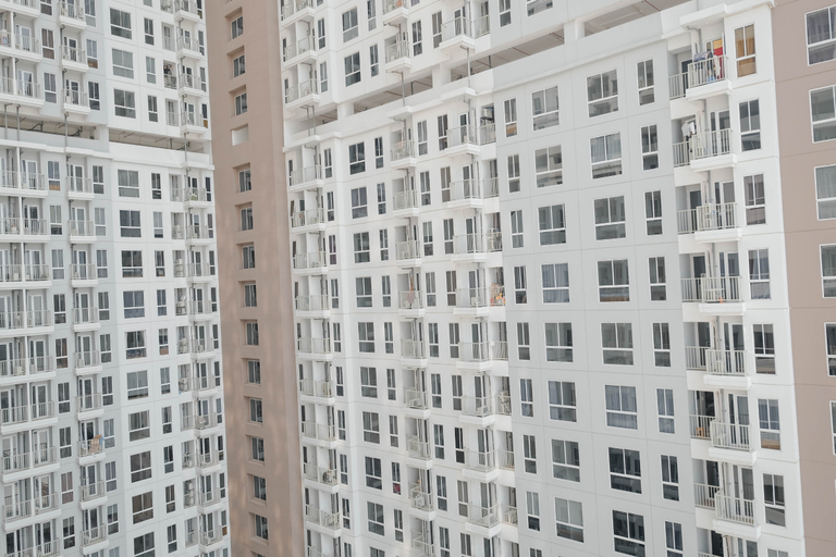 Exterior 4, Warm Minimalist Studio Room at Tokyo Riverside PIK 2 Apartment By Travelio, Tangerang