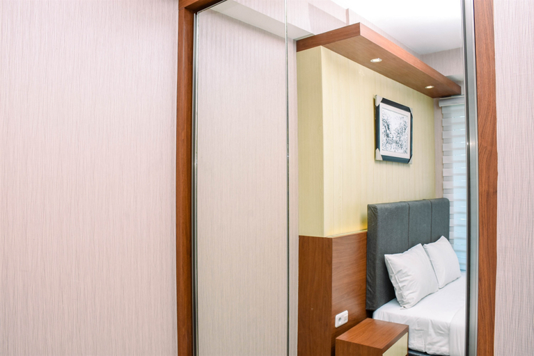 Bedroom 5, Spacious and Cozy 2BR Grand Kamala Lagoon Apartment By Travelio, Bekasi