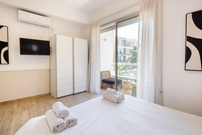 Bedroom 2, Stylish 3BR Apt w Balcony 5 min Walk from Beach