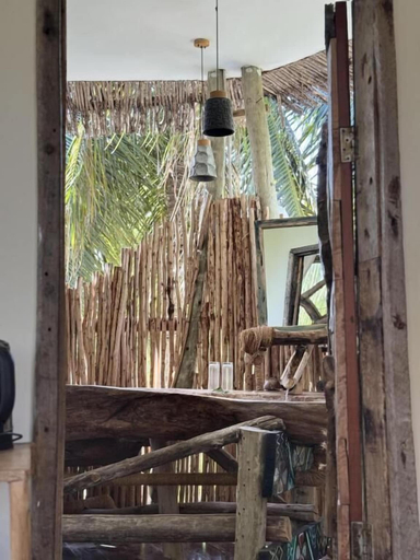 Outdoor dining, The Nest Boutique Resort, Kusini