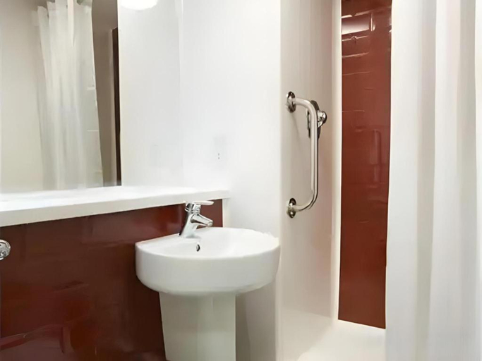 Bathroom 3, Travelodge Chichester Central, West Sussex