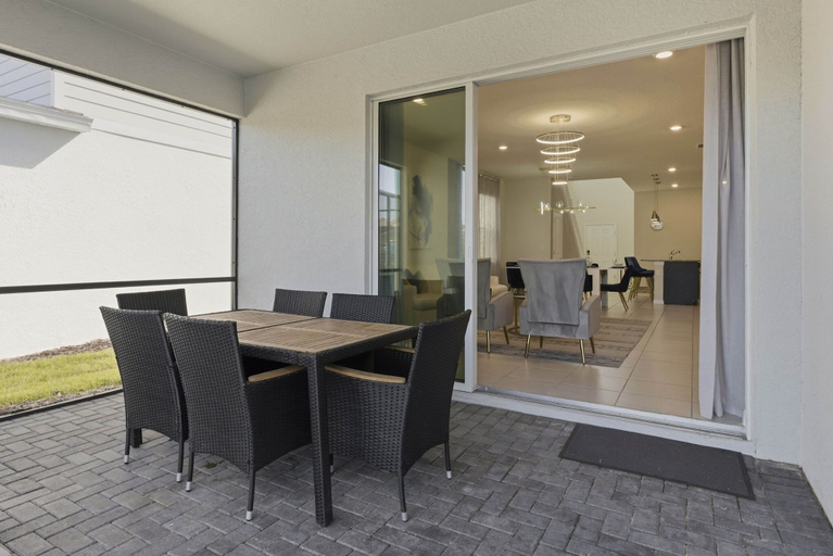 Outdoor dining, 6BR Themed Home w/ Pool Windsor Island, Polk