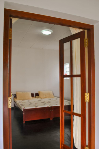 Bedroom 3, Gilbys Eco Bungalow, Nagoda