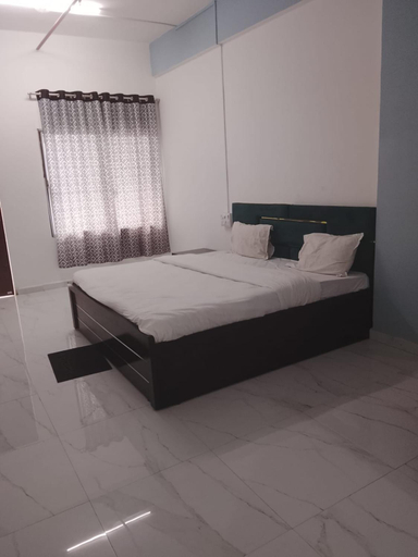 Bedroom 2, Hotel Krishna Rooms, Wardha
