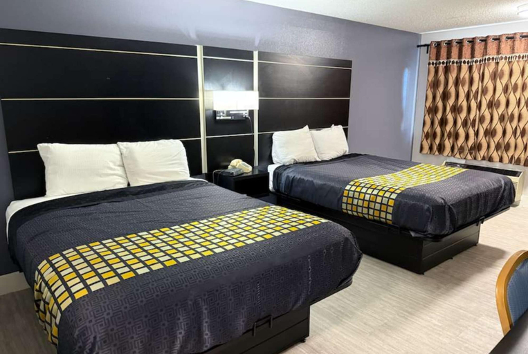 Bedroom 3, Coratel Inn & Suites by Jasper Hastings, Dakota