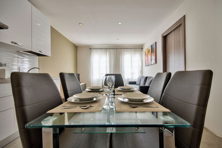 In-room dining 3, Amazing Airy Apartment Surrounded by All Amenities