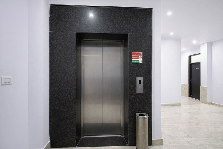 Elevator 2, FabHotel Crown Residency, Faridabad