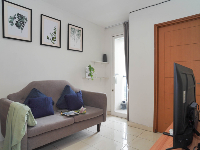 Living Room 3, Tranquil and Comfy 2BR at Cinere Bellevue Suites Apartment By Travelio, Depok