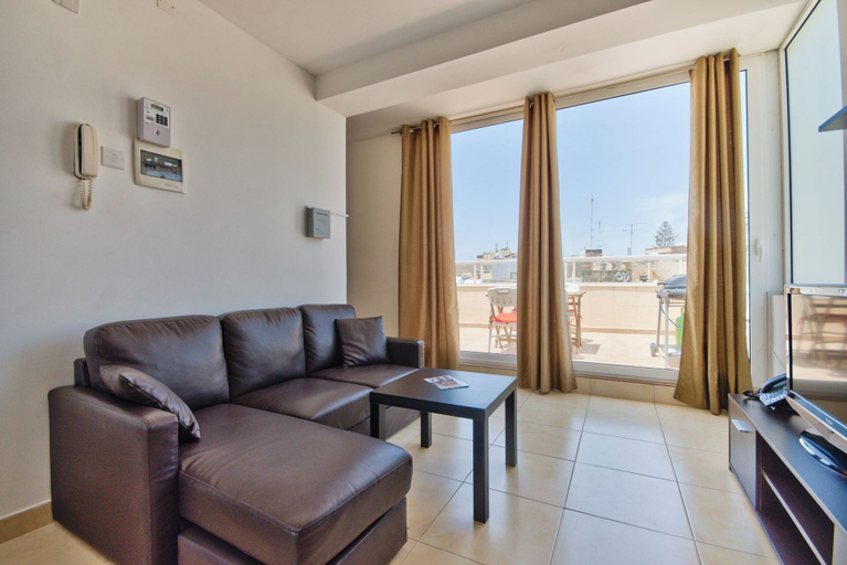 Living area 3, Stunning City Views Sliema Duplex Penthouse