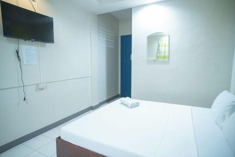 Bedroom 3, Tropical Place Hotel by RedDoorz, Puerto Princesa City