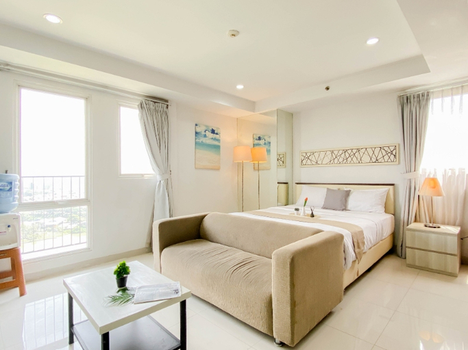 Living Room 4, Cozy and Roomy Studio Space at Apartment Azalea Suites By Travelio, Cikarang