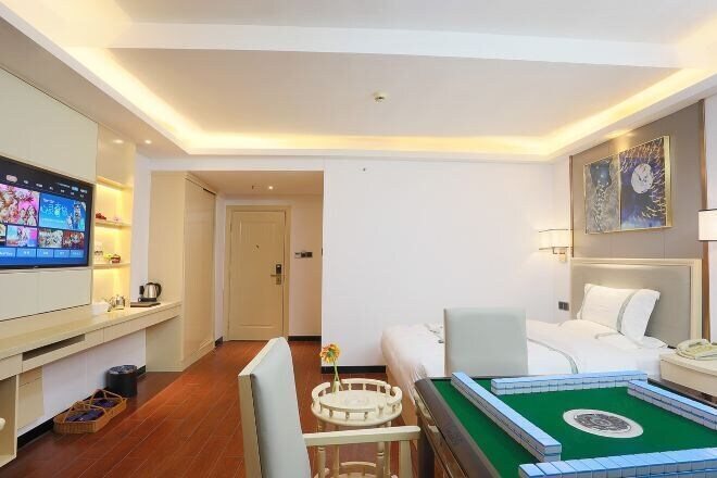 Bedroom 4, Bao Jia Business Hotel, Haikou