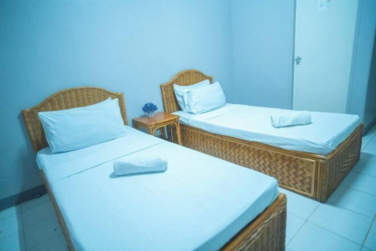 Bedroom 4, Tropical Place Hotel by RedDoorz, Puerto Princesa City