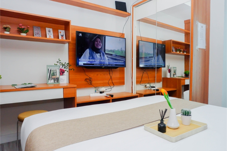 Bedroom 5, Good and Comfy Studio Apartment at Grand Kamala Lagoon By Travelio, Bekasi