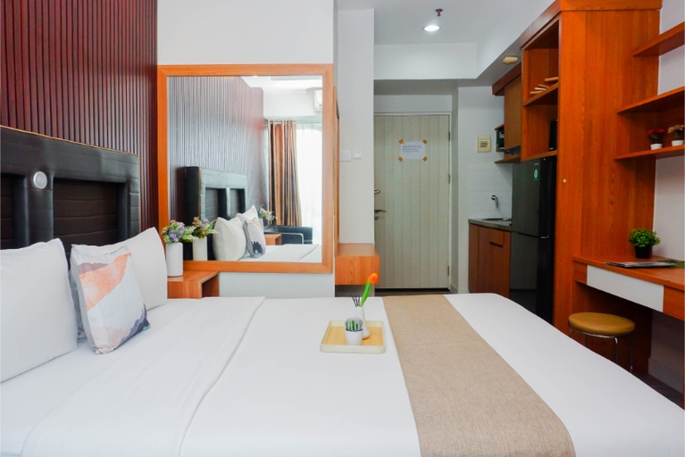 Bedroom 4, Good and Comfy Studio Apartment at Grand Kamala Lagoon By Travelio, Bekasi