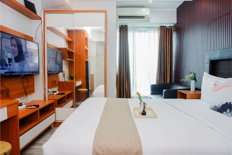 Bedroom 3, Good and Comfy Studio Apartment at Grand Kamala Lagoon By Travelio, Bekasi
