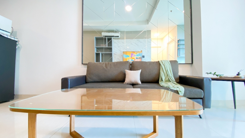 Living Room 2, Fancy and Good Design 2BR at Grand Madison Apartment By Travelio, Jakarta Barat