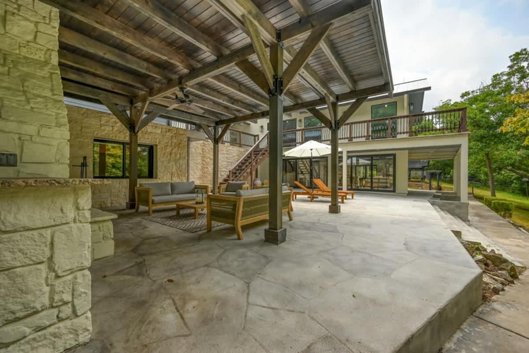 Exterior & Views 1, Luxury Riverfront Villa with Firepit & Gameroom!, Comal