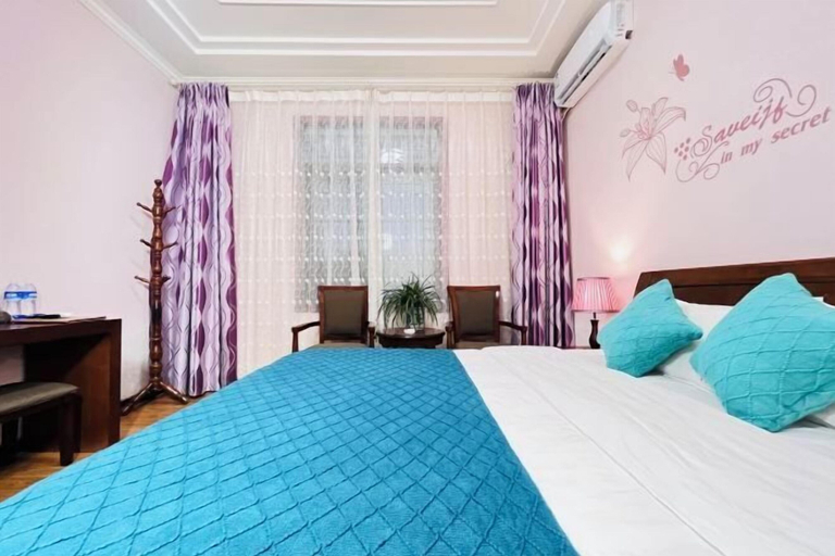 Bedroom 3, Zhongheyuan Inn, Meishan
