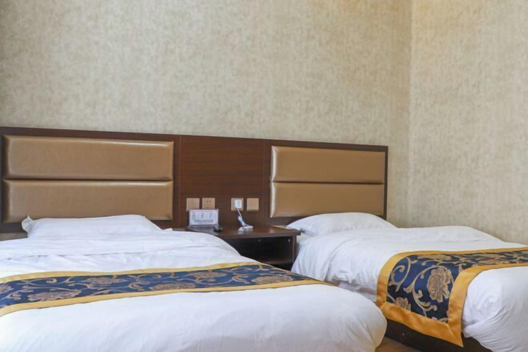 Bedroom 5, Yida Hotel (Changbai Mountain West Slope Tourist Transfer Center), Baishan