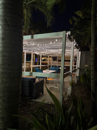 Outdoor dining 2, Penguins on the Beach Resorts 1, Brevard