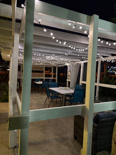 Outdoor dining 4, Penguins on the Beach Resorts 1, Brevard