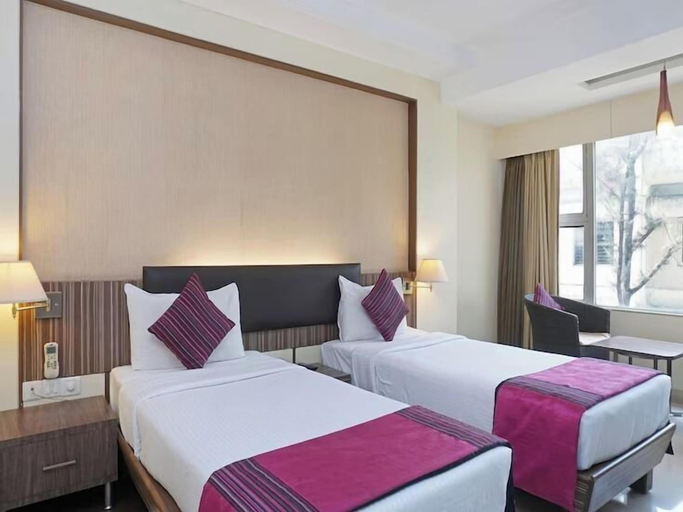 Bedroom 3, Kapila Business Hotel, Pune